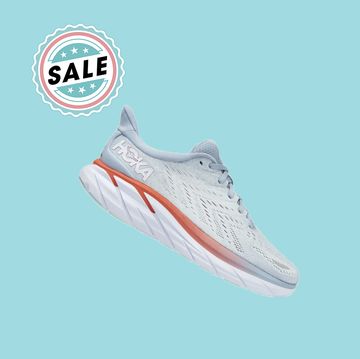 hoka sneaker in front of blue background with sale symbol