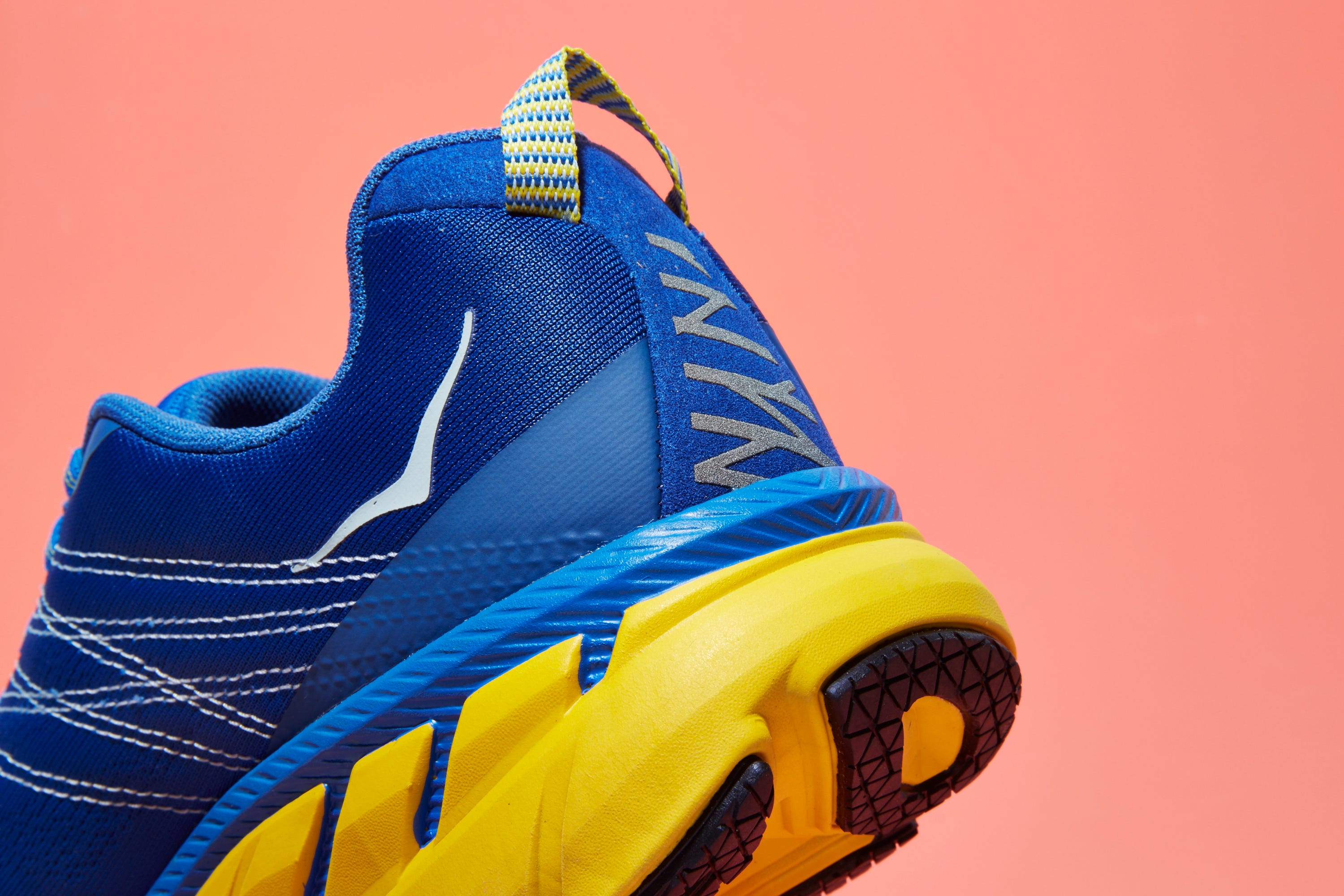 Footwear, Blue, Shoe, Running shoe, Yellow, Electric blue, Orange, Athletic shoe, Outdoor shoe, Basketball shoe, 