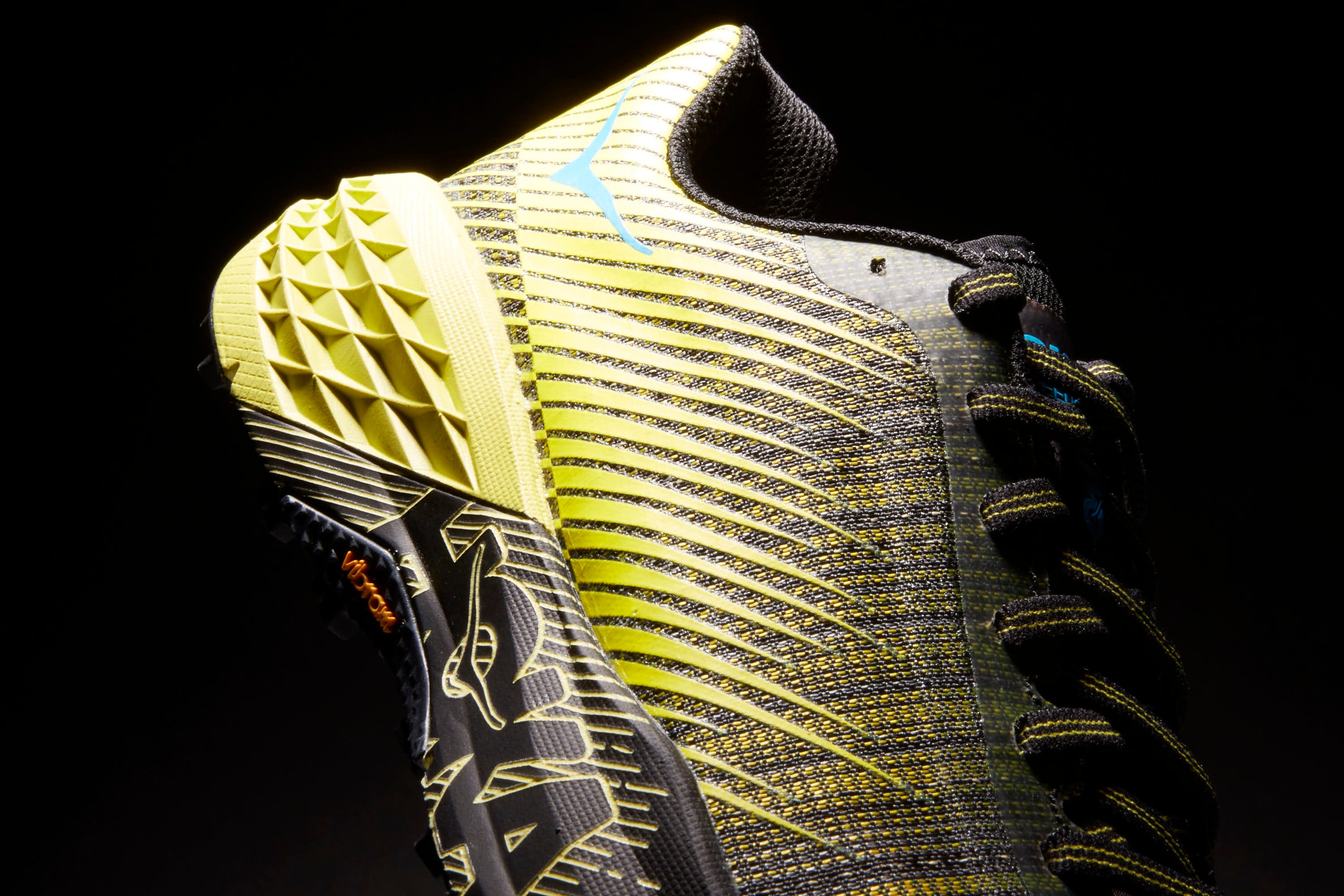 Architecture, Footwear, Yellow, Skyscraper, Shoe, Tower, Space, Athletic shoe, Nike free, 