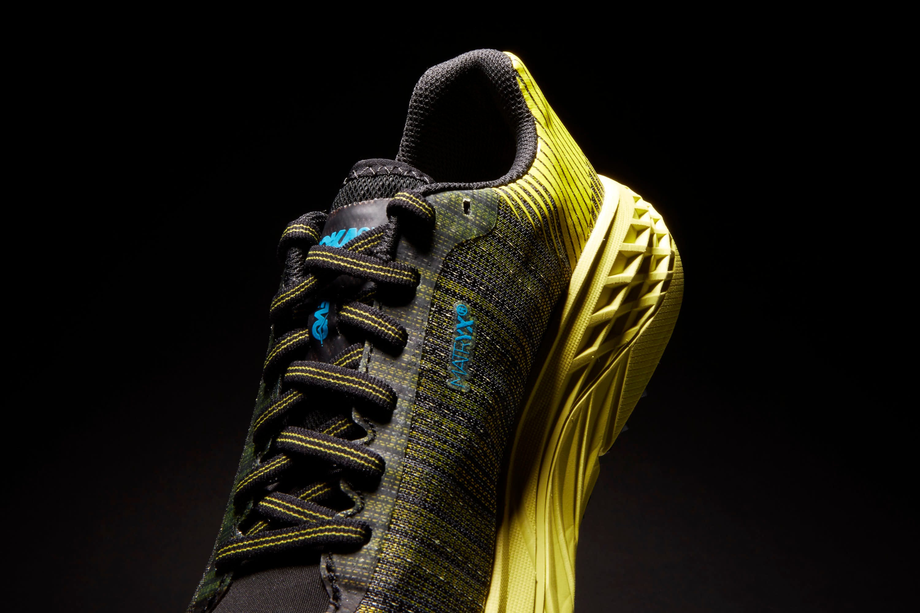 Footwear, Black, Shoe, Yellow, Architecture, Athletic shoe, Space, Nike free, 