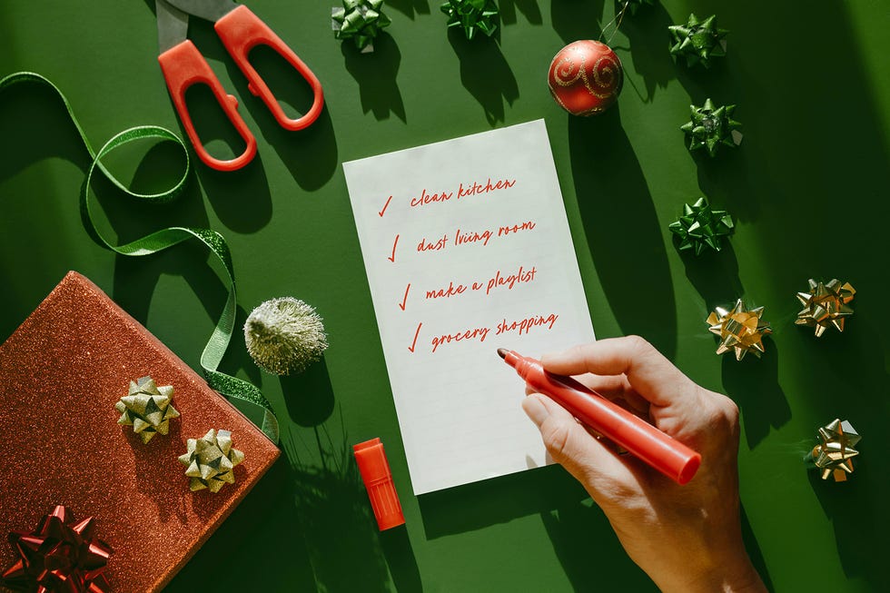 list of tasks on a notepad with holiday decorations