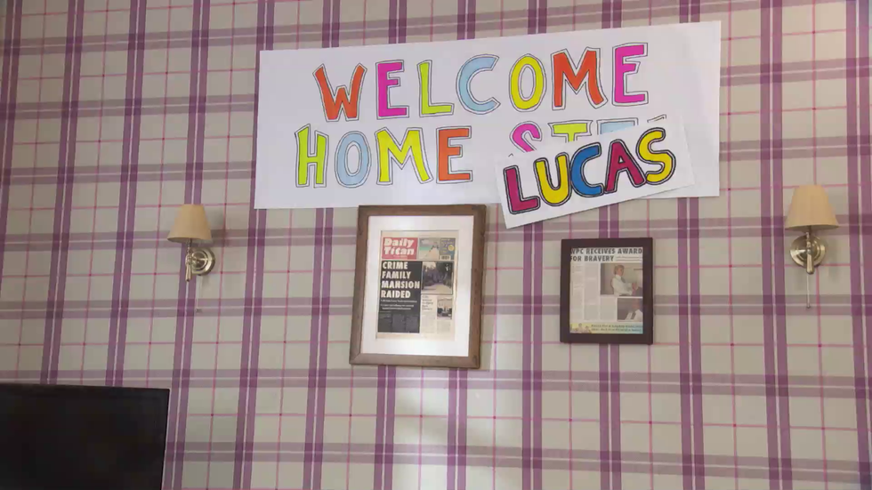 embargo 0700 11102024 lucas hay's welcome home sign in hollyoaks