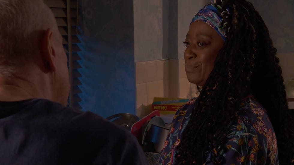 hollyoaks, an upset pearl in nightwear looking at jack in the kitchen