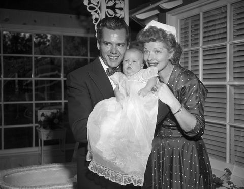 desi arnaz and lucille ball hold baby