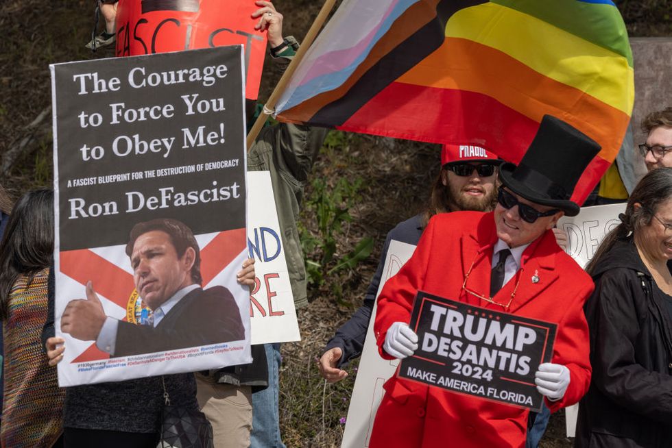 activists gather outside the ronald reagan presidential library to protest against ron desantis