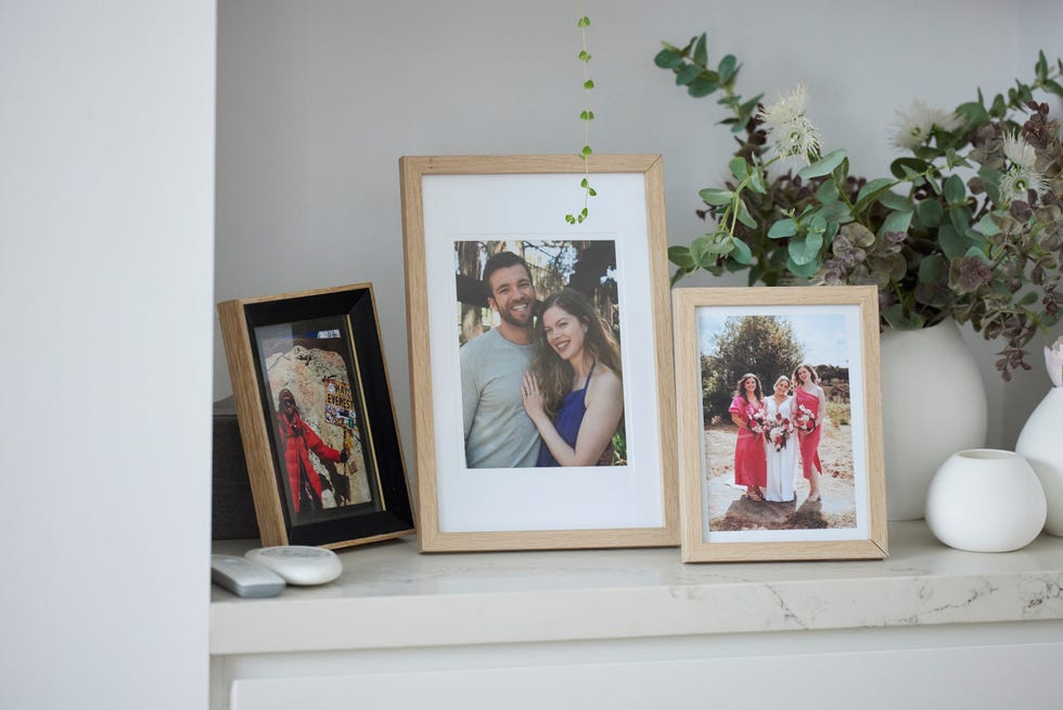 framed photos of levi and imogen fowler from happier times in home and away