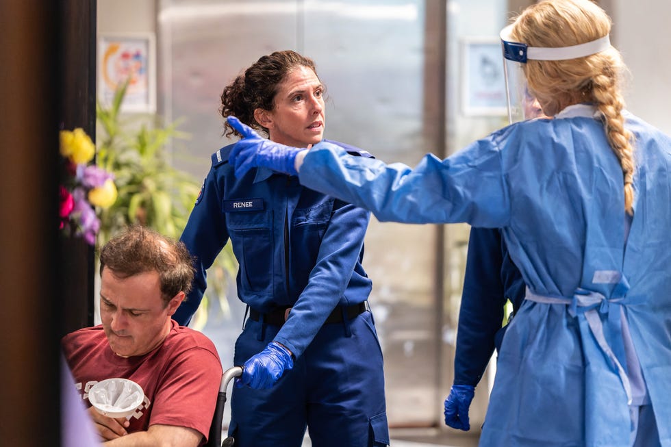 Bree Cameron watches as another patient is brought into the hospital in Home and Away bree cameron watches as another patient is brought into the hospital in home and away