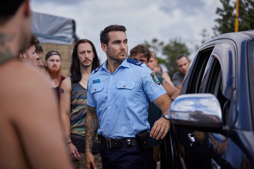 Cash Newman is surrounded by River Boys in Home and Away cash newman is surrounded by river boys in home and away