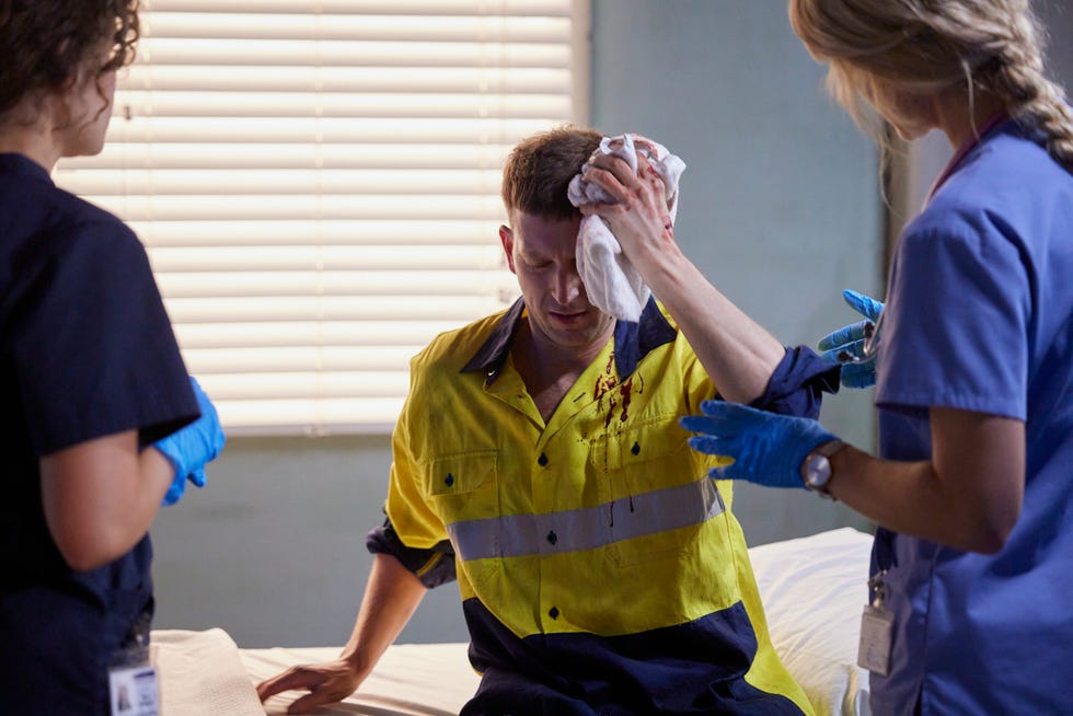 dana matheson and bree cameron with a patient in home and away