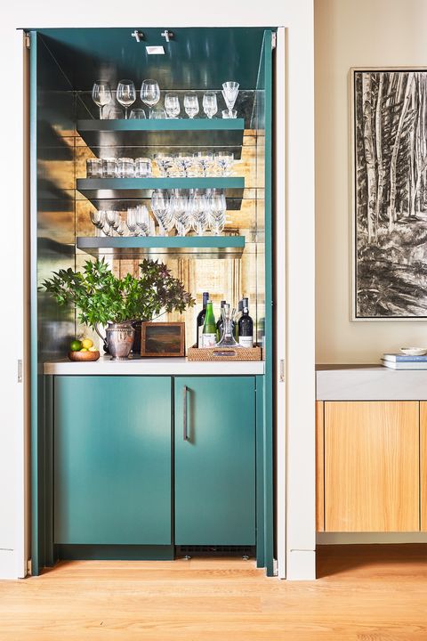 closet bar with blue green cabinets