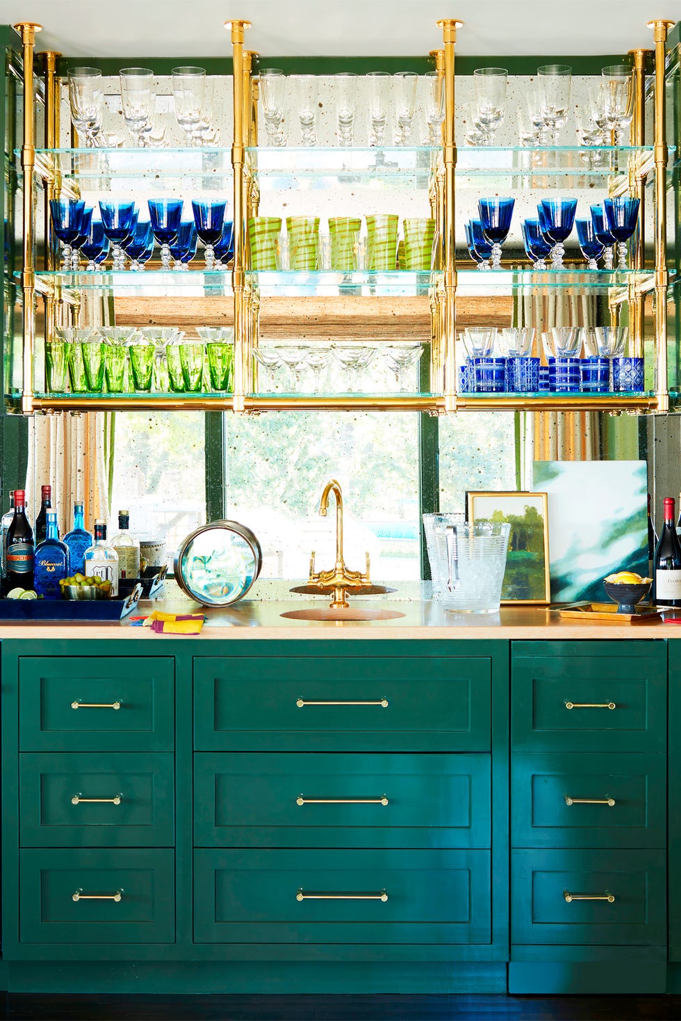 home bar with green cabinets