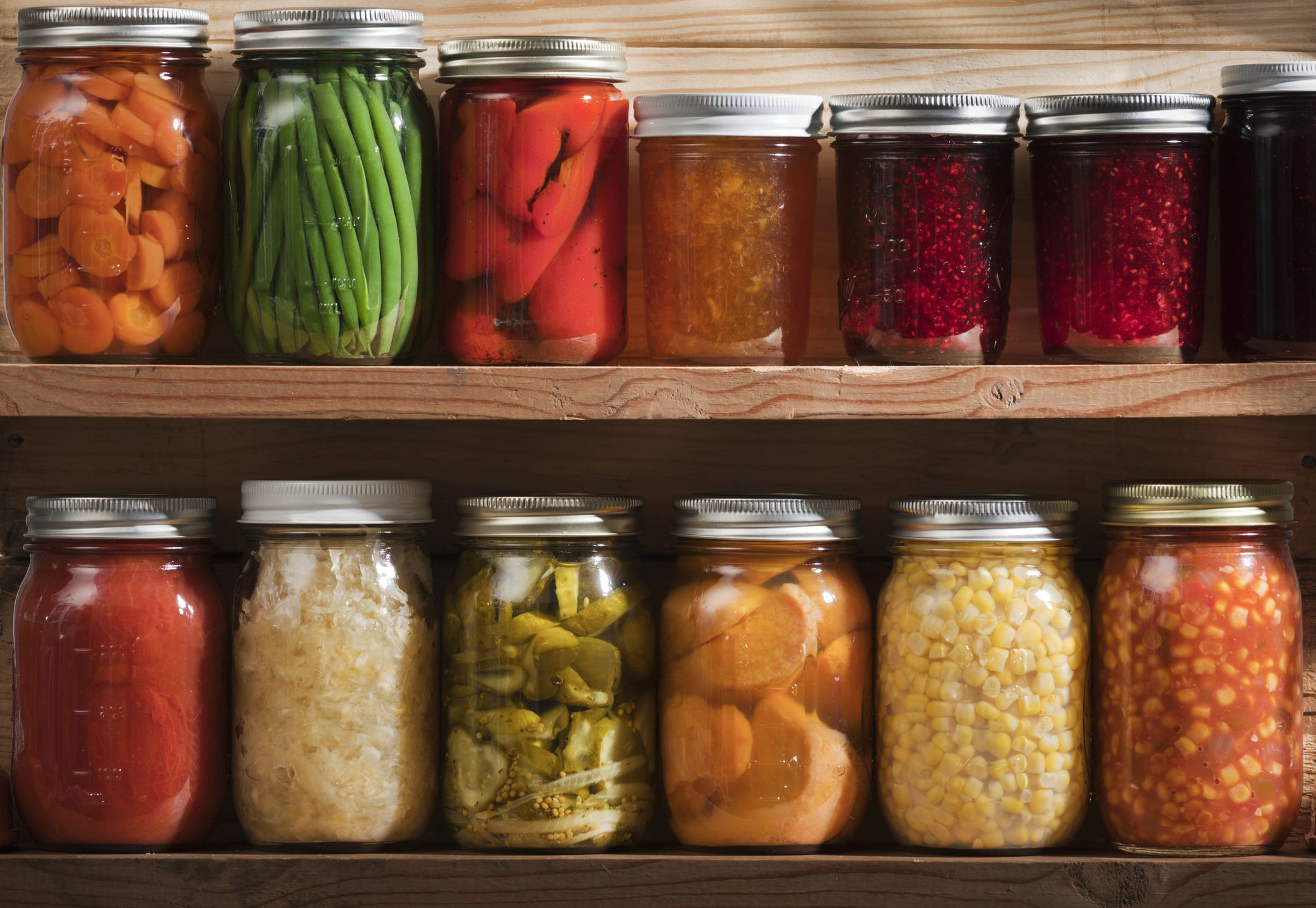 https://hips.hearstapps.com/hmg-prod/images/home-canning-preserving-pickling-food-stored-on-royalty-free-image-1692909356.jpg