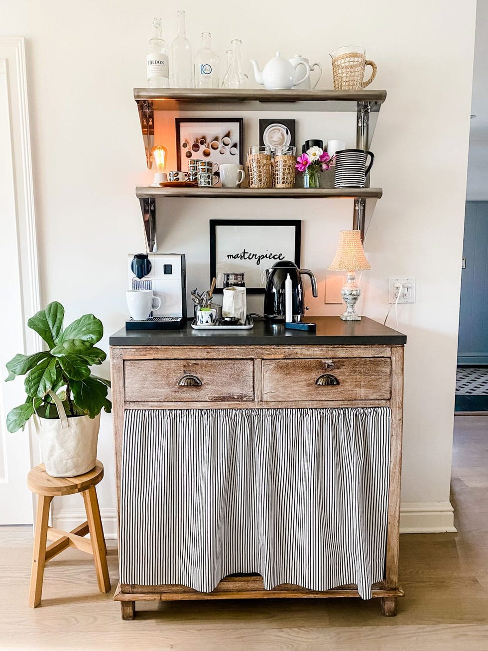 Wooden coffee cart with shelves and plants