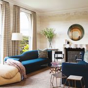 living room with blue sofas