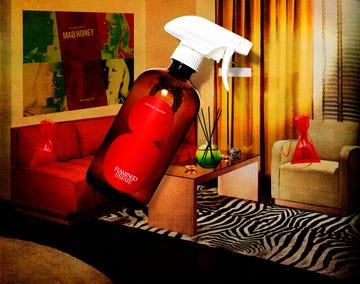 a surface cleaner bottle is prominently featured in a modern living room