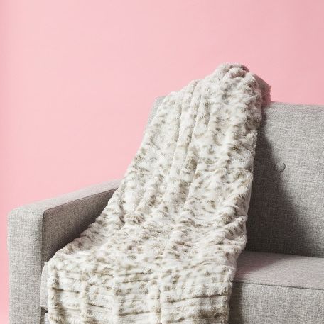 homegoods faux fur throw on chair