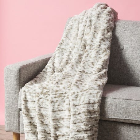 homegoods faux fur throw on chair