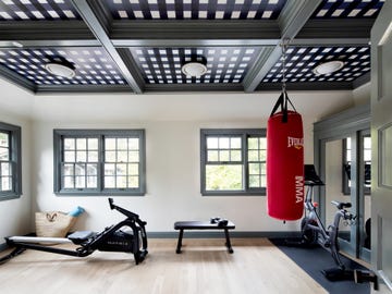 home gym with ceiling wallpaper