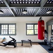 home gym with ceiling wallpaper