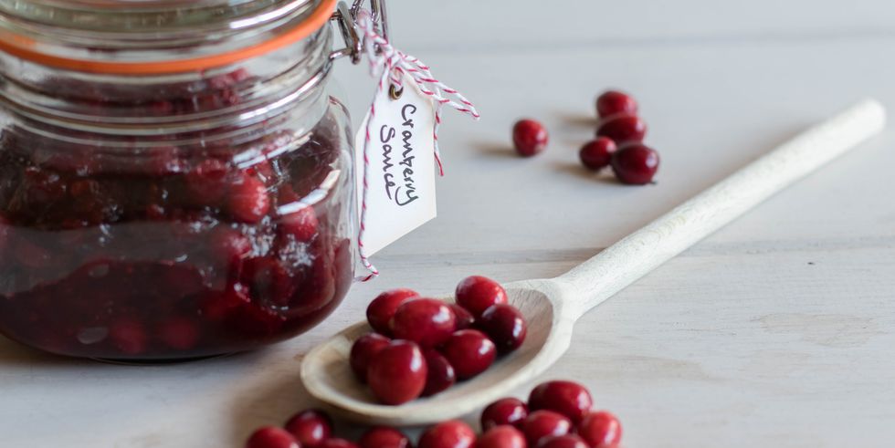 Home made cranberry sauce in jar with tag (label)