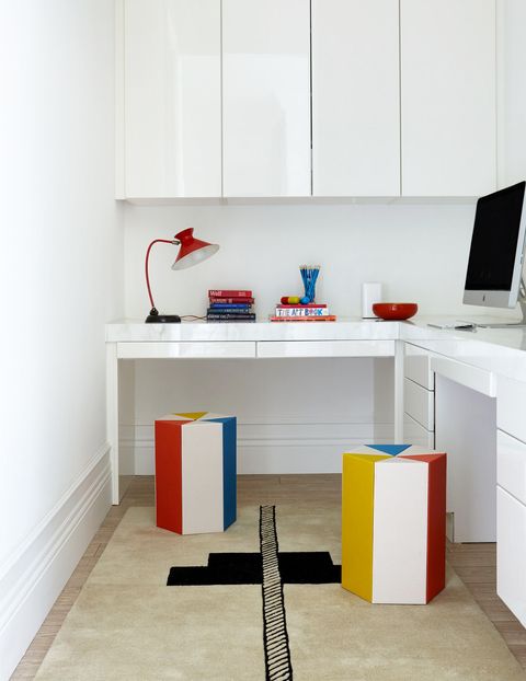 white desk with primary color modern stools