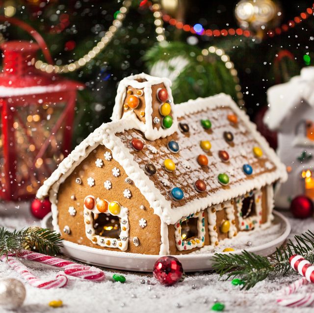 https://hips.hearstapps.com/hmg-prod/images/homemade-christmas-gingerbread-house-with-holiday-royalty-free-image-1699455080.jpg?crop=0.669xw:1.00xh;0.191xw,0&resize=640:*