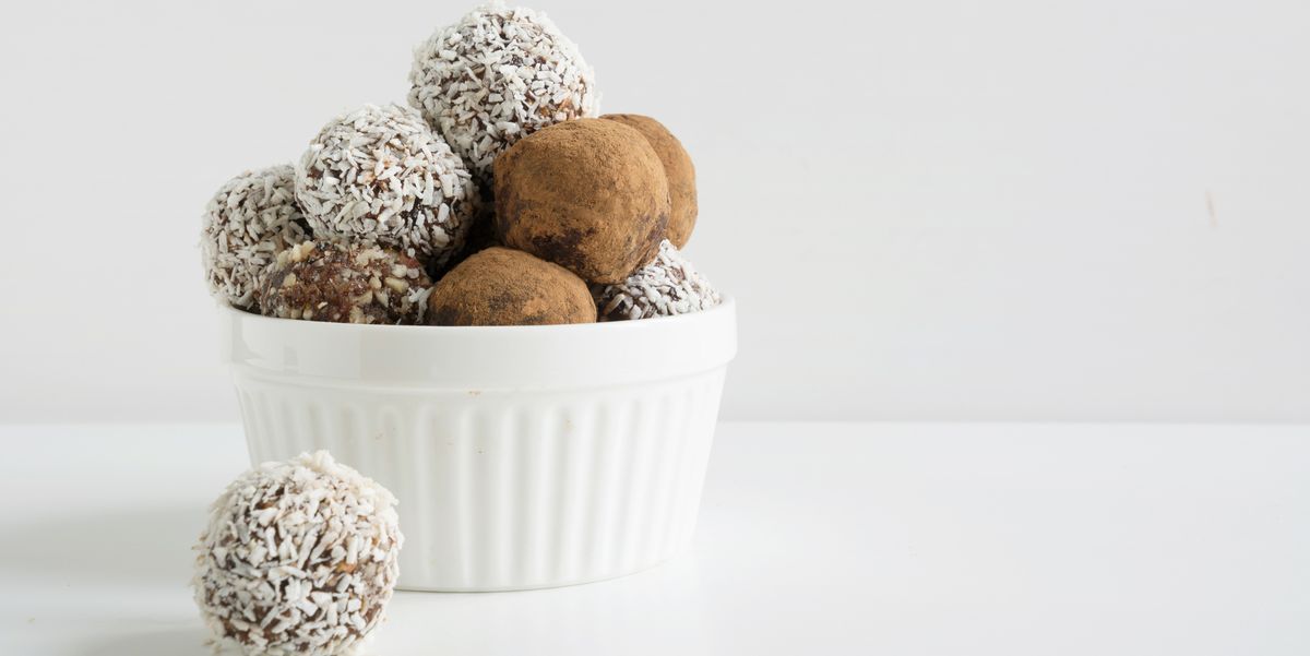 Homemade energy balls with cacao, coconut. Healthy food for children and vegan, sweets substitute.
