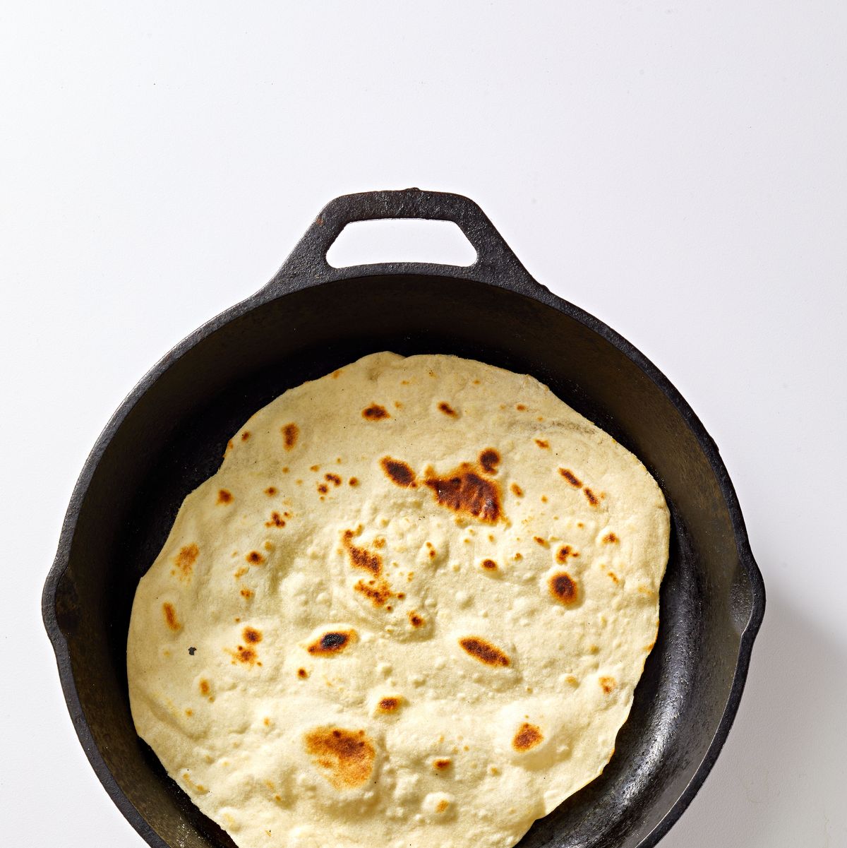 https://hips.hearstapps.com/hmg-prod/images/homemade-flour-tortillas-64343308e2f52.jpg?crop=0.958xw:0.639xh;0,0.125xh&resize=1200:*