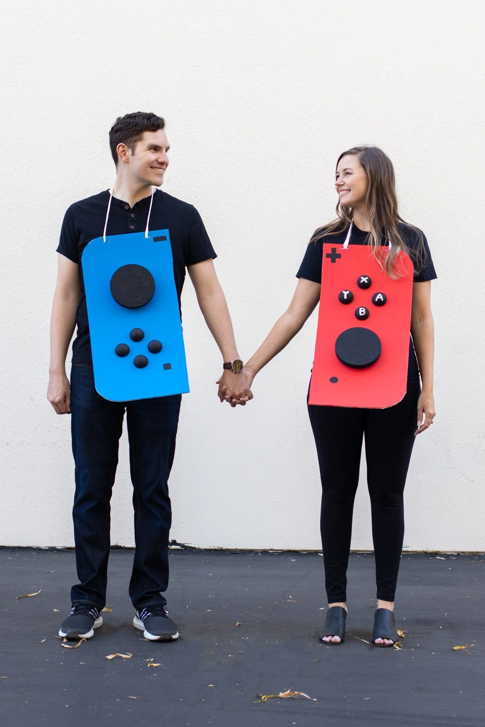 homemade halloween costumes, a man and woman wearing diy nintendo switch costumes