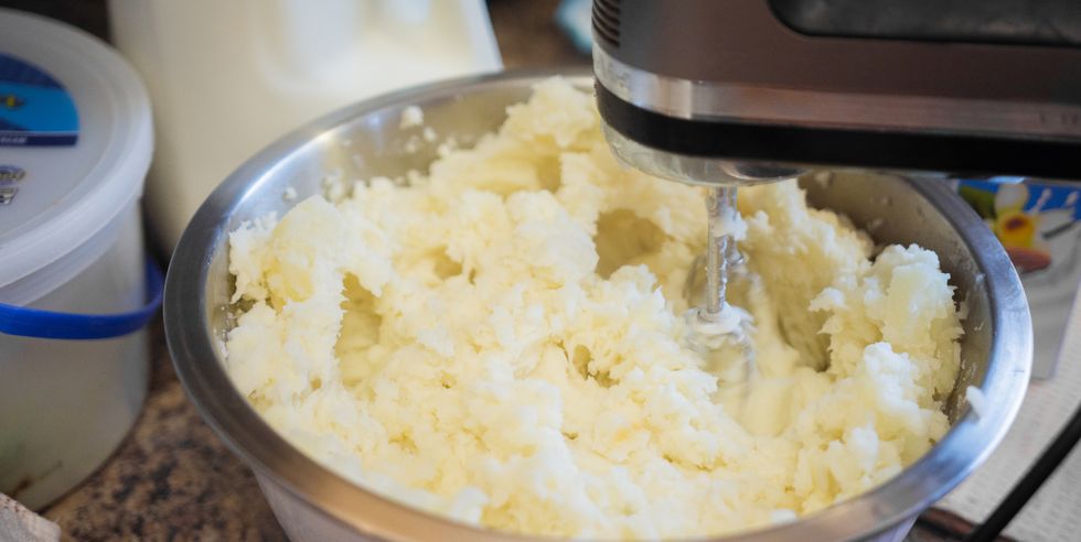 homemade mashed potatoes being mixed up
