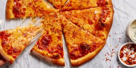 a pizza with cheese and sauce