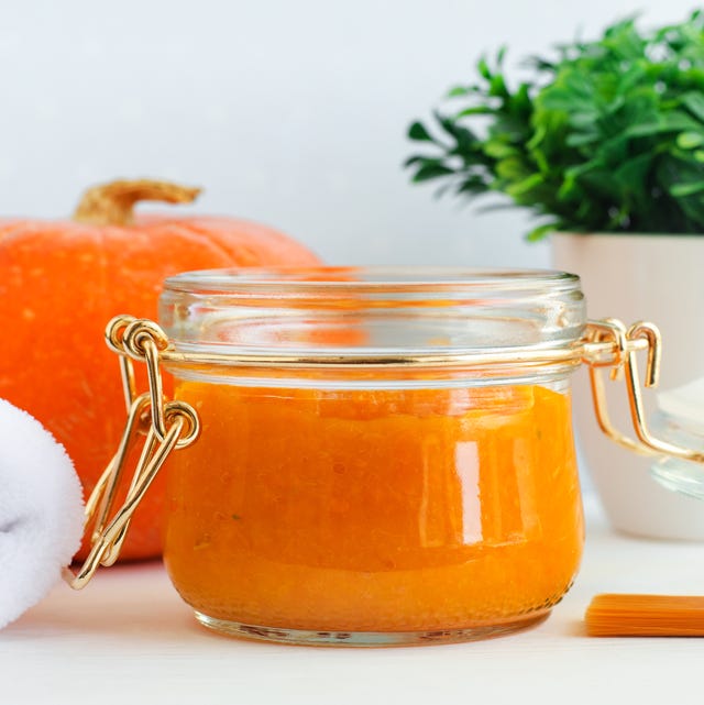 homemade pumpkin face mask in a glass jar diy cosmetics and spa recipe copy space