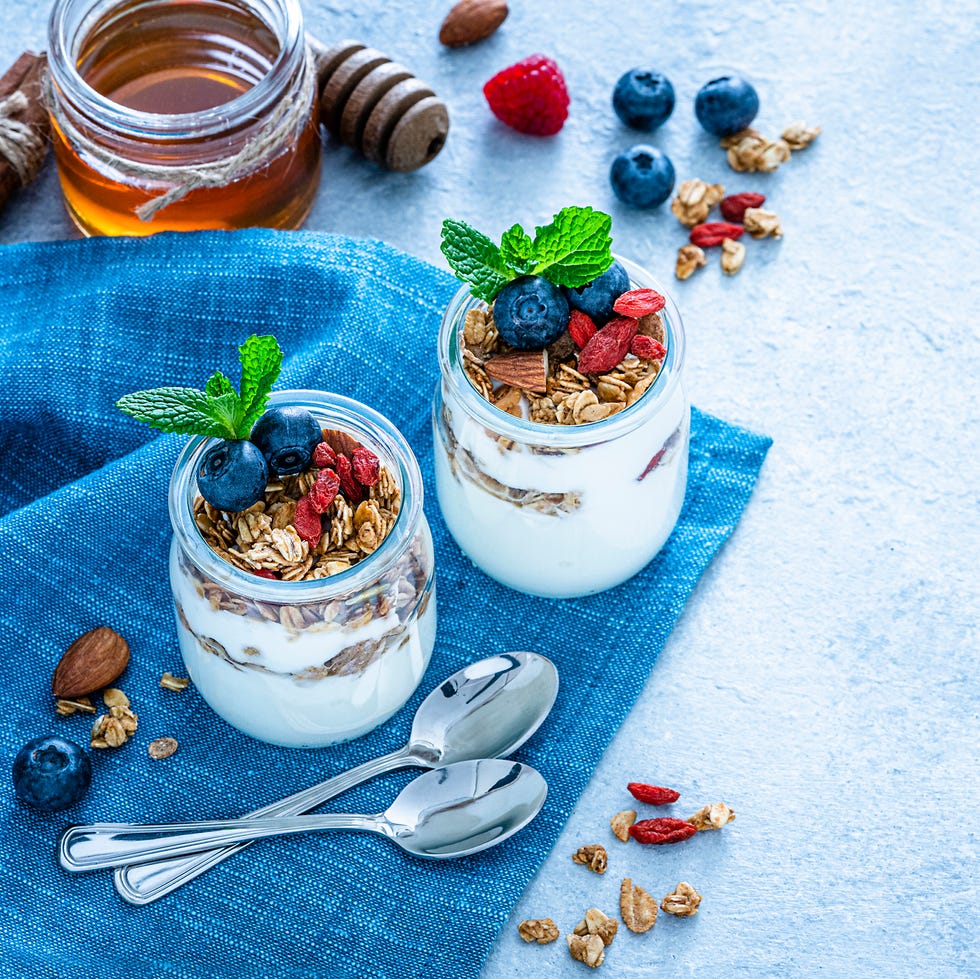 homemade yogurt and granola on blue table