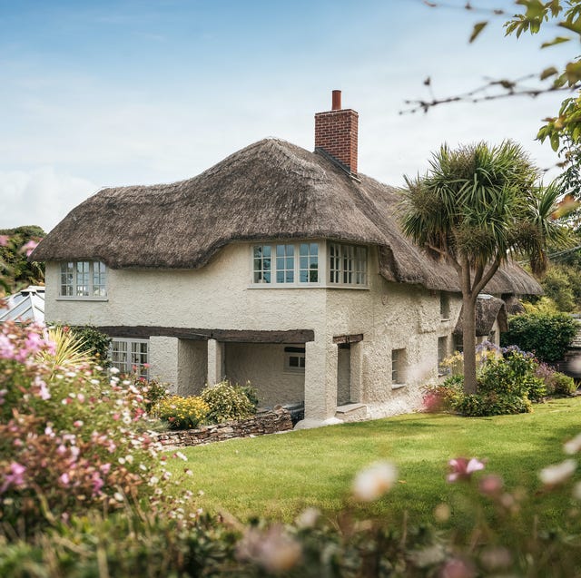 a house with a garden in front of it