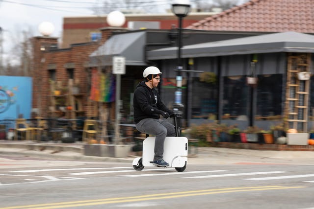 Meet the All New Motocompacto: An Electric Suitcase Ride by Honda, by Mr.  Business Magazine