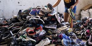 pile of running shoes collected by soles4souls