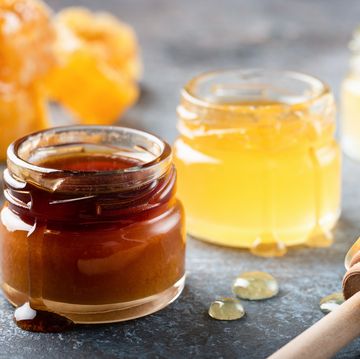 Honey In Jar With Wooden Honey Dipper, Liquid Honey