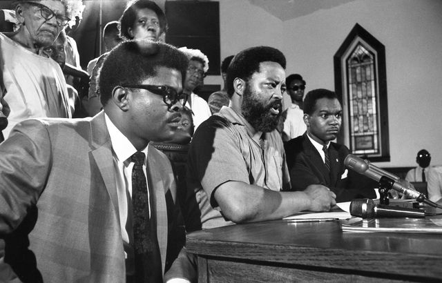 Reverend Hosea Williams of the Southern Christian Leadership Conference (center) and some of his "poor people," appear at a news conference. Williams, the Reverend W.C. Wales of Cocoa (left), and Walter e. Fauntroy (right) of Washington announced plans for demonstrations to coincide with the launch of Apollo 11. July 14, 1969 (Bettmann Archive/Getty Images)