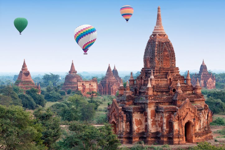 hot air balloons flying over bagan, mandalay division, myanmar