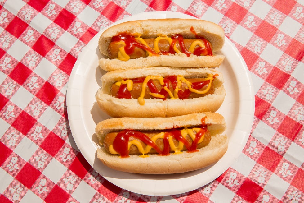 hot dogs from above, summer bbq foods layout, hot dog buns overhead