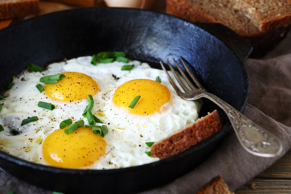 Hot fried eggs in a pan