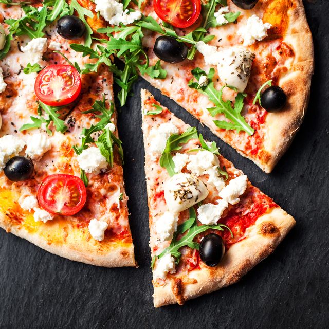 https://hips.hearstapps.com/hmg-prod/images/hot-pizza-slice-with-melted-mozzarella-cheese-and-royalty-free-image-903663384-1551284160.jpg?crop=0.907xw:0.604xh;0.0519xw,0&resize=640:*