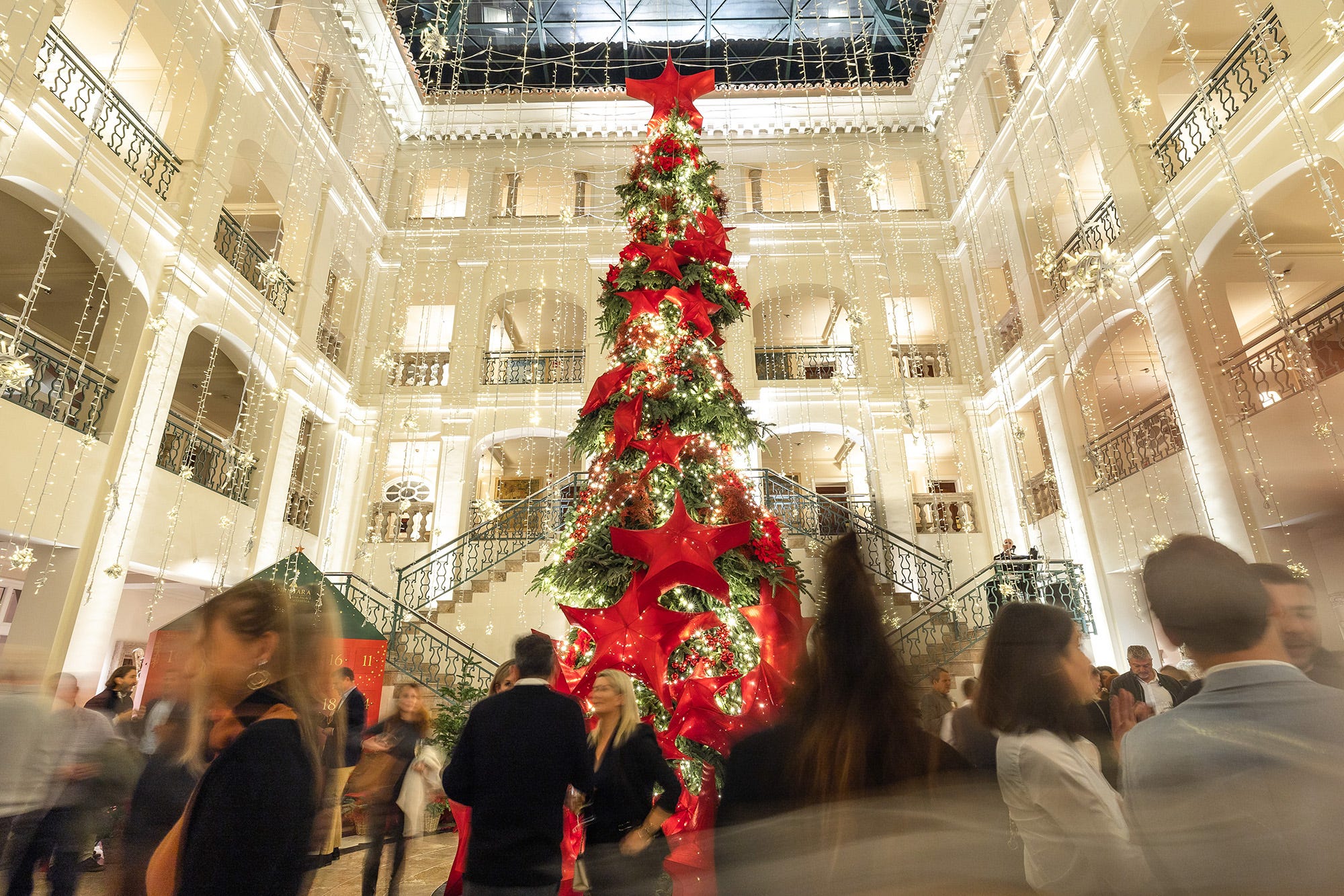 a large christmas tree in a building