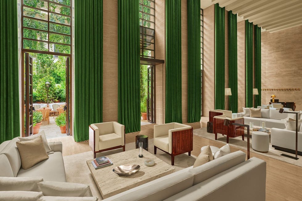 modern living room with open doors to a garden area