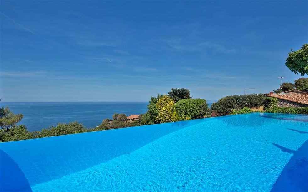 Swimming pool, Property, Azure, Vacation, Resort, Real estate, Sea, Villa, Sky, House, 