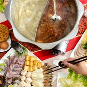 hot pot with noodles eggs fish cabbage