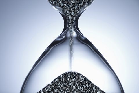 Numbers flowing in hourglass