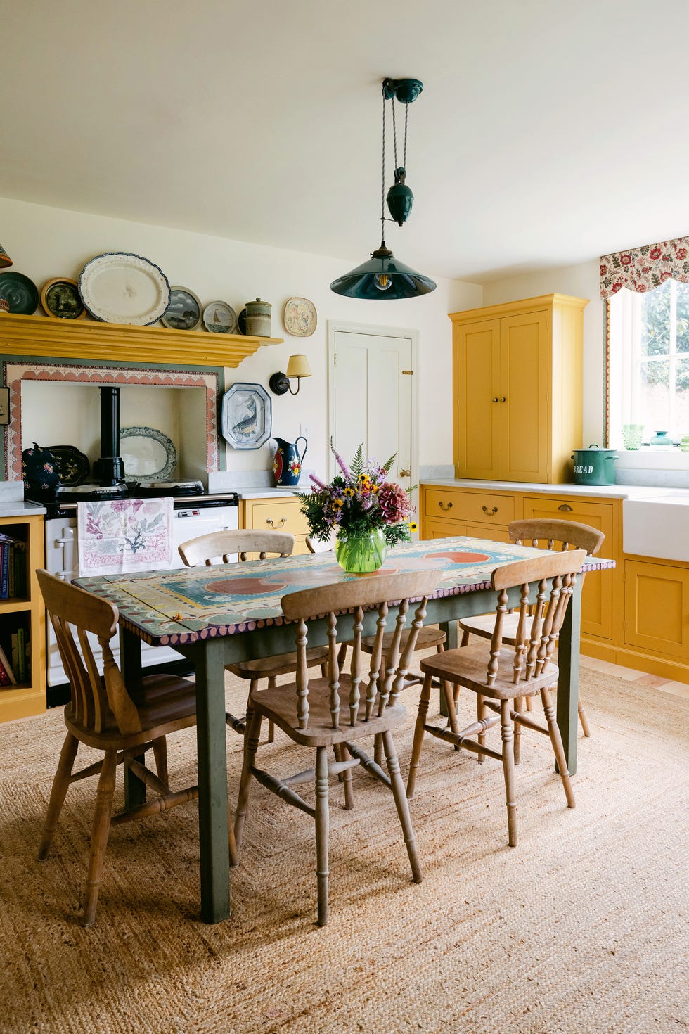 a dining room table with chairs a dining room table with chairs