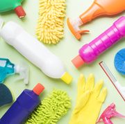 House cleaning product on green background