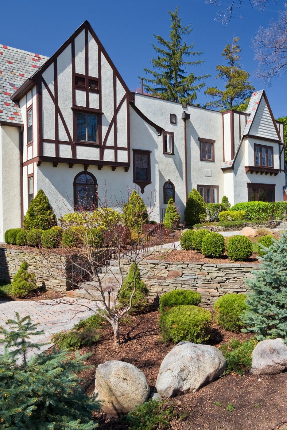 House - Home exterior in Tudorian style, real estate house home exterior in tudorian style, real estate